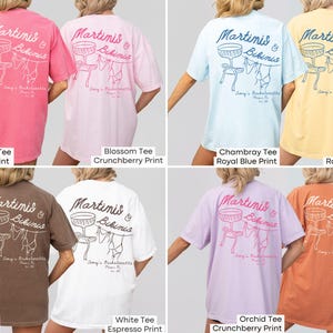 May include: A set of ten t-shirts featuring a graphic of martini glasses and bikinis with the text "Martinis & Bikinis". The t-shirts are available in a variety of colors, including pink, light blue, yellow, brown, white, lavender, and orange.