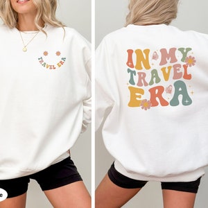 Show off your wanderlust with this In My Travel Era sweatshirt. Perfect for road trip lovers who enjoy the open road and new destinations.