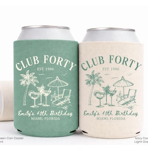 Two green and beige Club Forty themed beverage coolers, each with a palm tree and beach umbrella design, and the text "Club Forty" and "Est. 1986" printed on them.