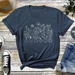 Fun and trendy DnD merch with a floral arrangement and geometric dice, ideal for Dungeon Masters and DnD enthusiasts.