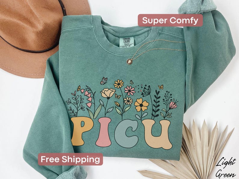 Comfort Colors floral PICU nurse sweatshirt, a cozy and stylish gift for pediatric ICU nurses or Nurse Week recognition.