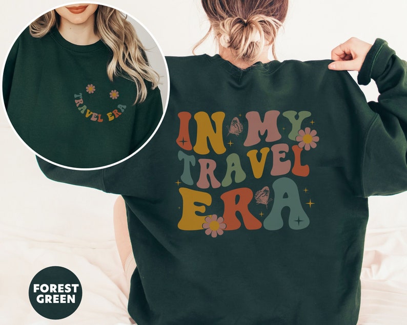 Trendy sweatshirt with an eye-catching In My Travel Era design. Ideal for travel bloggers or influencers who love to showcase their journeys in style.