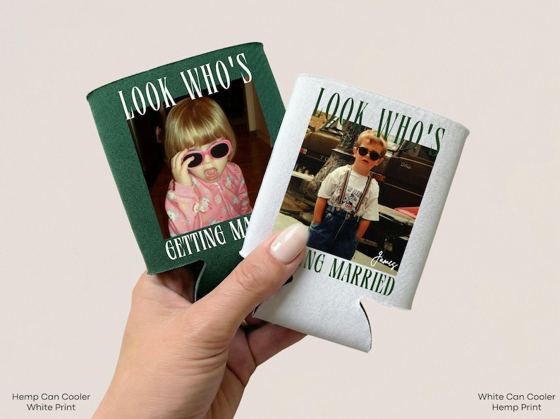May include: Two can coolers, one dark green and one white, each featuring a printed photograph of a child wearing sunglasses. The text "LOOK WHO'S GETTING MARRIED" is printed in a bold, dark font above and below the photo on each cooler.