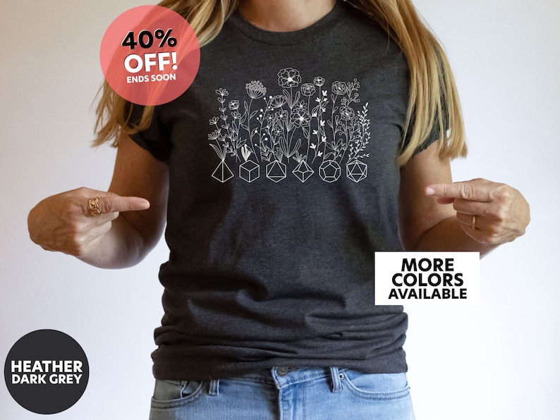 Stylish DnD shirt with a floral design and D20 dice, perfect for Dungeons and Dragons fans who love a mix of nature and fantasy.