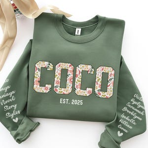 Custom Floral Coco Sweatshirt With Kid Names on Sleeve: Mothers Day Gift For Grandma Tee