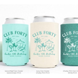 Three Club Forty beverage coolers in different colors - turquoise, beige, and teal - with the text "Club Forty" and "Est. 1986" printed on them.