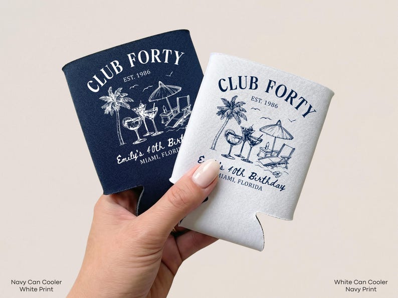 A hand holding two navy blue and white club Forty birthday party coolers, each with a unique design.