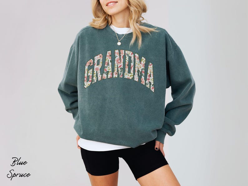 This cozy floral Grandma shirt celebrates the special role of grandmothers with beautiful floral designs. A perfect gift for any grandma to wear proudly. Great for a christmas present.