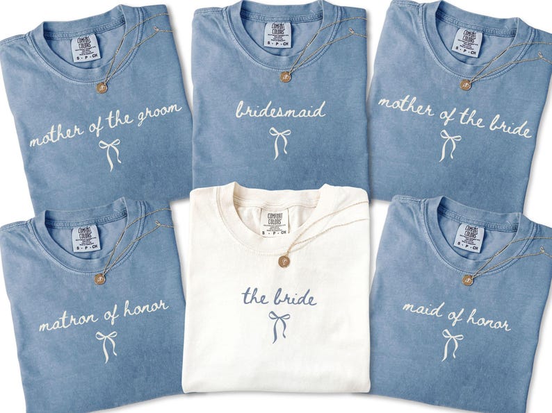 Coordinated bridal party tees displayed together for a clean cohesive look. Perfect for group bachelorette outfits and wedding morning memories.