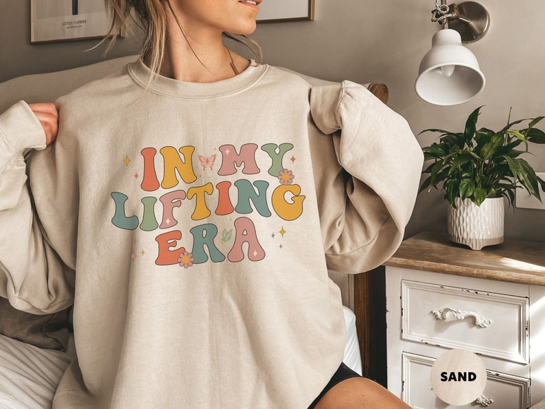 Fun sweatshirt with the phrase In My Lifting Era. A great fit for weightlifters or anyone who loves hitting the gym and staying strong.