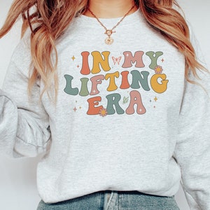 Comfortable sweatshirt featuring the In My Lifting Era design. Perfect for those who love weightlifting, powerlifting, or any fitness routine.