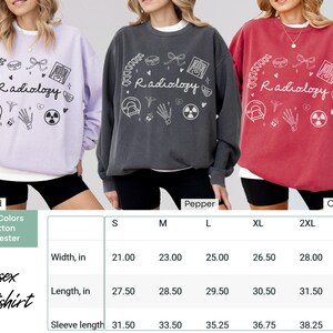 May include: Unisex sweatshirt with the text "Radiology" and various medical symbols in white on a purple, gray, or red background. The size chart shows measurements in inches for width, length, and sleeve length.
