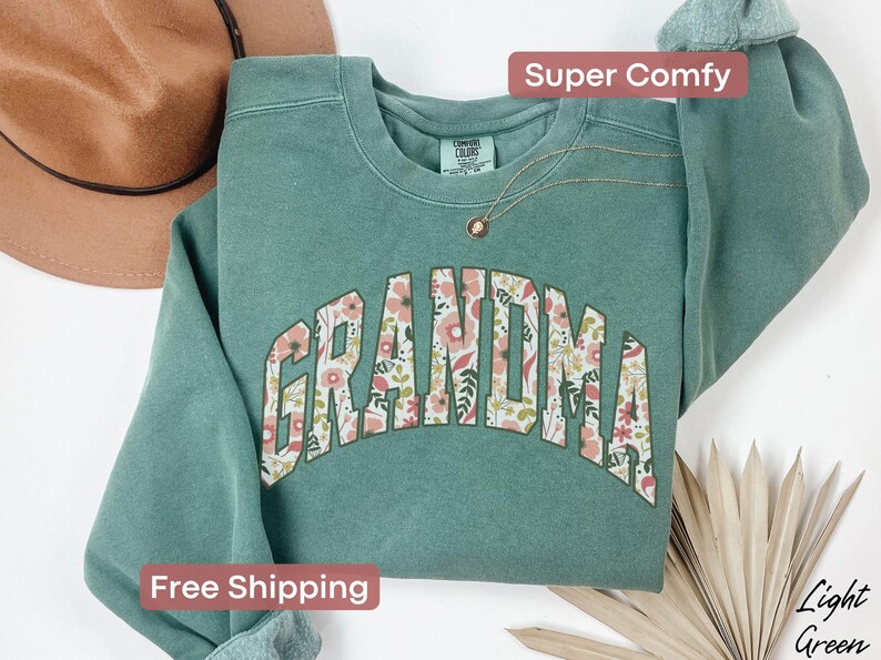 This cozy floral Grandma shirt celebrates the special role of grandmothers with beautiful floral designs. A perfect gift for any grandma to wear proudly. Great for a christmas present.