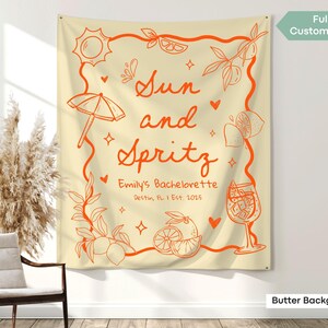 Cocktail-themed bridal shower sign with Love At First Spritz and Let’s Get Spritzy vibes, ideal for matching bach decor.
