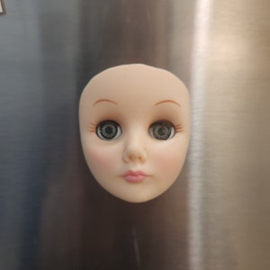 Vintage Dollfl Face Magnet