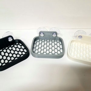 soap dish with suction cups and two sided tape for mounting versatility