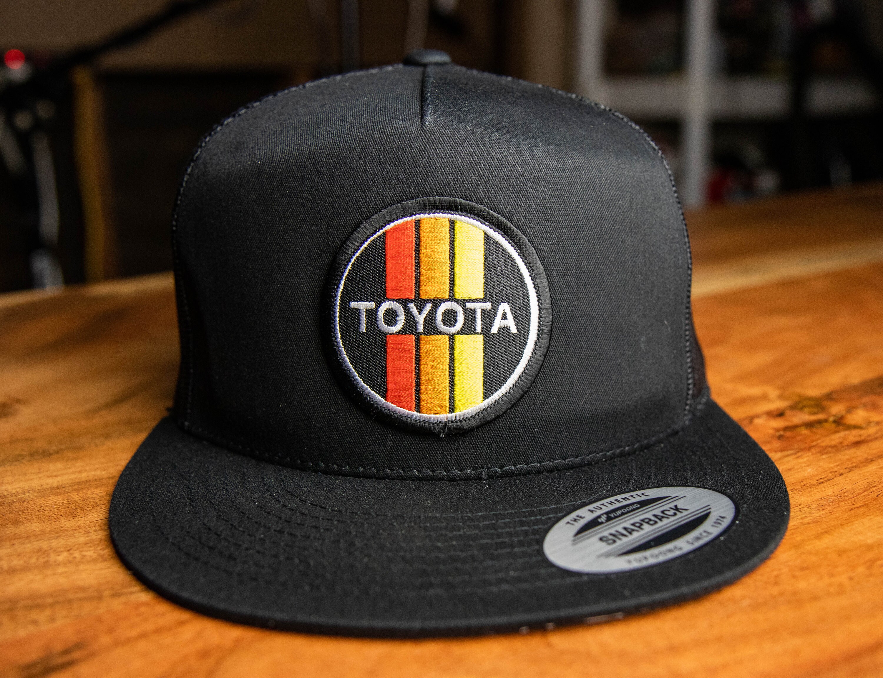 TOYOTA Circle Retro Racing Stripes Black Snapback Trucker Hat With  topographic Design Under Flat Brim -  Canada