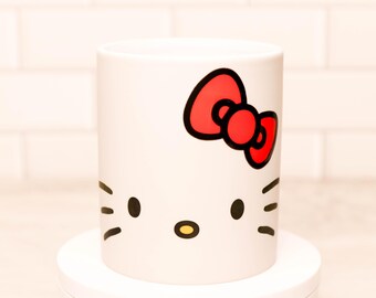 Taza Kawaii Hello Kitty que cambia de color, negra mate, de 11 oz