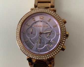 Michael Kors mk- 6169 watch. Quality!! Blush face Rose Gold. Large face 31mm. Analog. Designer watch. Fashion accessory. Well worn. Jewelry.