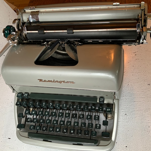 Vintage Remington Rand Typewriter. Keyboarding. Logging. Office display. 1960’s. Administration. Classic business machine. Clerical. Typing.