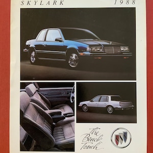 May include: A vintage Buick Skylark brochure from 1988. The brochure features a blue Skylark saloon, a close-up of the interior seats, and a rear view of the car. The text "The Buick Touch" and the Buick logo are also included.