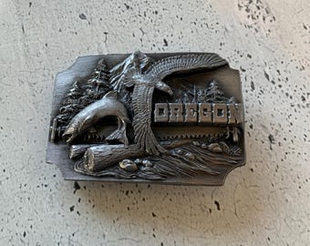 Oregon riemgesp. Tin. Siskiyou Buckle Co. Y-44. Designer herenmodeaccessoire. Cowboykleding. 1990.