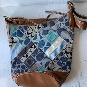 Coach bag. Vintage designer purse. Handbag. Fashion accessory. Clothing. High quality attire. Ladies’ fashion. With Coach tag. Shoulder bag.