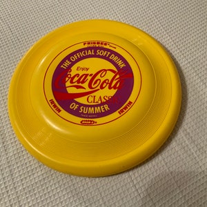 ¡Wham-o, frisbee de Coca-Cola! Irwin.