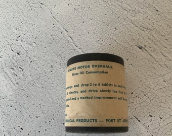 Engine Pills!! 1920’s. Snake oil petroliana. Tune-up in a can. Cardboard round container. Paper label. Vintage oil and gas. Service station.