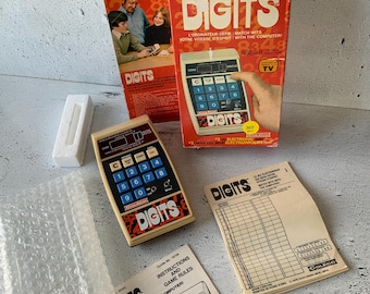 Coleco z 1978 roku (wersja francuska: kanadyjska). Cyfry. Rzadka, zabytkowa elektronika. Gry elektroniczne z pierwszego roku. W oryginalnym pudełku. Komputer.