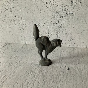 Lead Toy Cat Figurine. Vintage/antique lead toy. 1 of 2 Die cast. Solid. Seam lines. Date uncertain. Small lead toy. 2 1/2” Animal figurine.