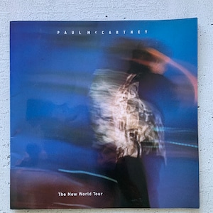 Paul McCartney 1993 The New World Tour Concert Program/Photographic book. Promo pages. The Beatles. Linda McCartney. Brian Clarke artist.