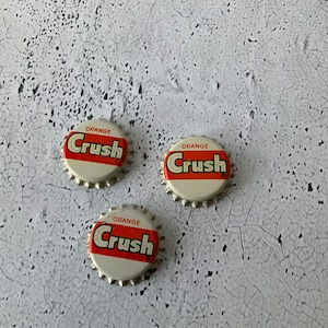 Orange Crush Bottle caps. Cork lined. 1950’s/1960’s. Group of three. Vintage Soda collectibles. Cola cap. Authority Crush International Ltd.
