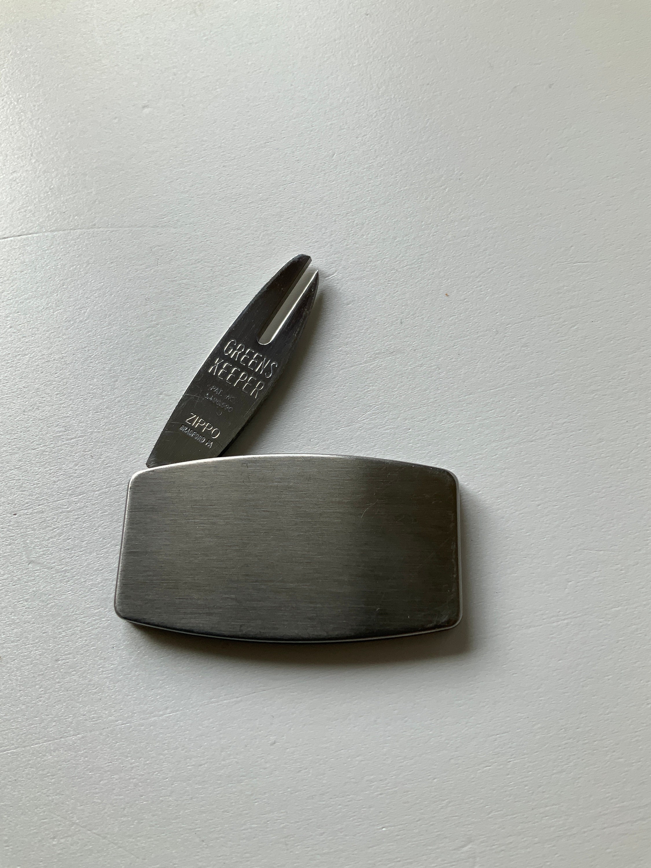 Zippo Greens Keeper. Quality!! Ad Piece. SGI Canada. Golf. Cleat