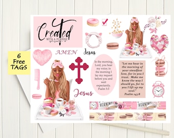 May include: A set of pink and white planner stickers with religious quotes and illustrations. The stickers feature a woman in pajamas, a cross, a heart, a donut, a cup of coffee, and a plate of macarons. The text on the stickers includes "Created with a Purpose", "Amen", "Jesus", "In the morning, Lord, you hear my voice", "Let me hear in the morning of your steadfast love", and "Psalm 143:8".