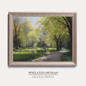 May include: A framed painting of a park scene with a pond, trees, and a path. The trees are green and yellow, and the pond is blue. The path is brown and leads to the center of the painting.