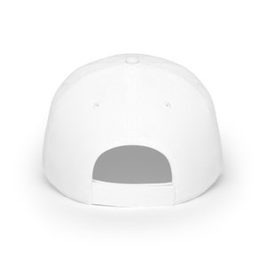 May include: A white baseball cap with a blank back panel. The cap is made of a soft, breathable fabric and has a classic, timeless design.