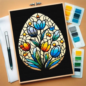 May include: A colourful stained glass design of a bouquet of tulips in an egg shape. The tulips are blue, orange, yellow, and green. The background is black.