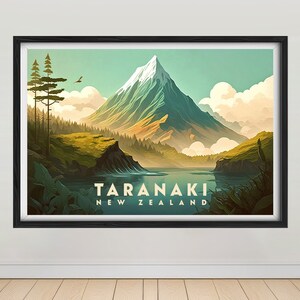 May include: A vintage-style travel poster featuring a mountain range with a lake in the foreground. The poster is titled "TARANAKI NEW ZEALAND".