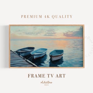 May include: A painting of three blue wooden boats docked at a wooden pier. The boats are in a calm body of water with a sunset sky in the background.