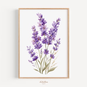 May include: A framed watercolor print of lavender flowers. The artwork features a cluster of purple lavender blooms with green stems and leaves, set against a white background. The frame is made of light-colored wood. The print is signed "id.ArtDeco Prints".