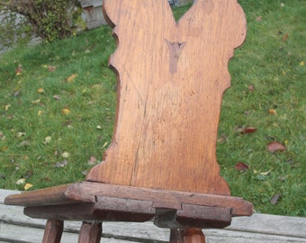 Very old children's chair, with inlays on the seat, also suitable as a chair for dolls or decoration