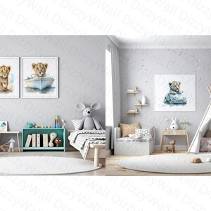 May include: Two framed watercolor paintings of a lion cub. One painting shows the lion cub holding blue balloons, the other shows the lion cub riding in a blue boat. The paintings are hanging on a light gray wall in a nursery.