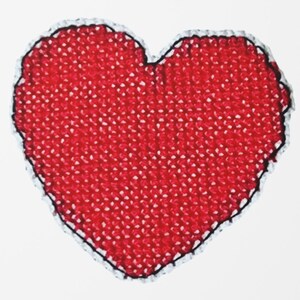 May include: A red heart-shaped item with a white and black border. The heart is filled with small white dots, creating a textured appearance. The item is likely handmade, possibly crocheted or knitted, and is set against a white background.