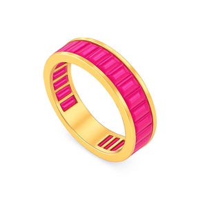 May include: A gold ring with a band of bright pink rectangular stones. The ring has a smooth, polished gold band and a continuous row of pink stones around the top. The stones are set closely together, creating a vibrant, eye-catching design.
