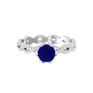 Twisted Sterling Silver Ring: Lab-Created Blue Sapphire & Moissanite
