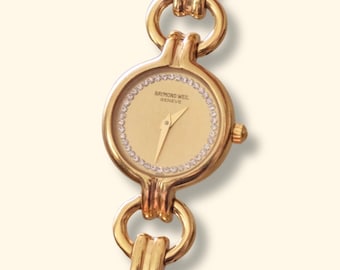 Damski zegarek Raymond Weil z lat 90. XX wieku, platerowany 18-karatowym złotem, z kryształową tarczą i akcentem, działający