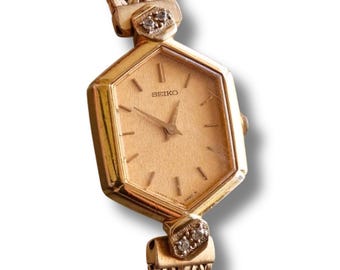 Raro reloj de cuarzo Seiko Jewellery chapado en oro de los años 80 con esfera hexagonal.