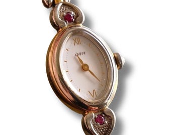 Reloj Citizen Chère bicolor para mujer, ultra raro y pequeño, con dos piedras preciosas rojas.