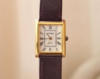 Vintage Citron Quartz Uhr: Goldfarbenes Gehäuse, Braunes Lederarmband